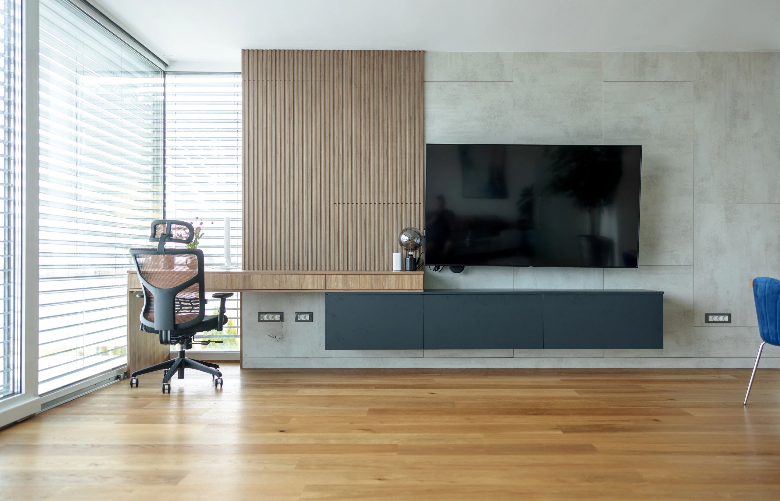 Home theater living room with TV and sound system setup